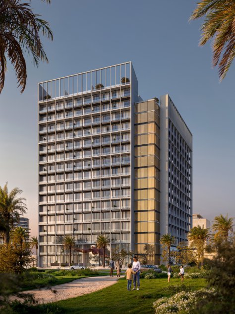 Modern high-rise building at Muheira Maysan with residents enjoying the green space and palm trees.