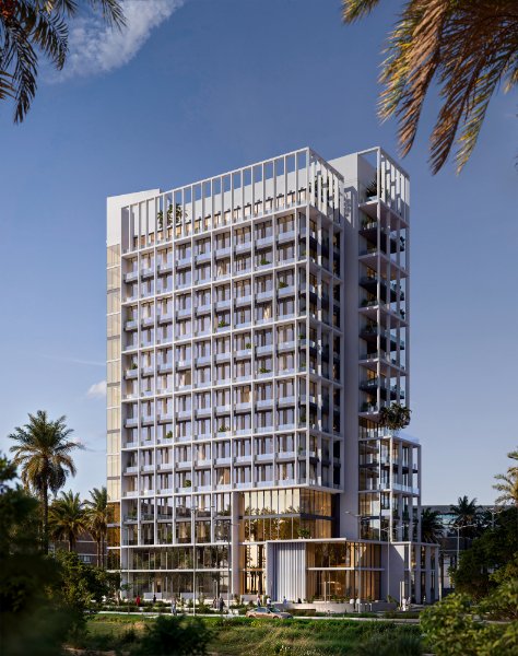 Modern high-rise building at Muheira Maysan surrounded by palm trees under a clear sky.