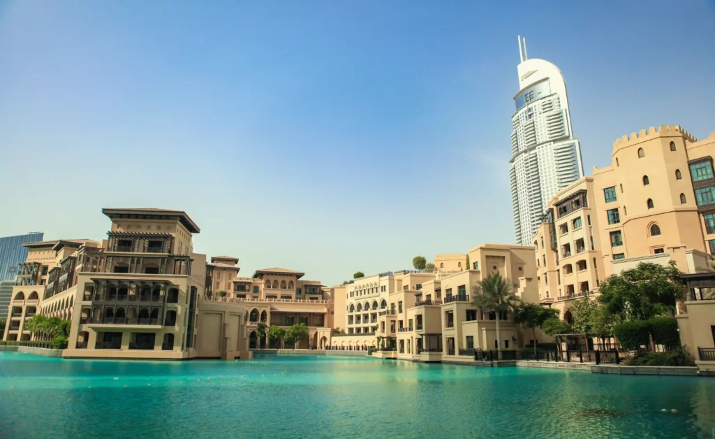 Modern buildings beside tranquil blue water part of villas for rent in dubai