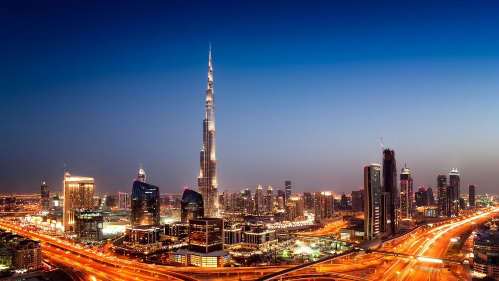 properties for rent in the UAE showing Dubai skyline at dusk with Burj Khalifa